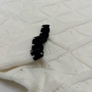 White and black too with perforated hearts.